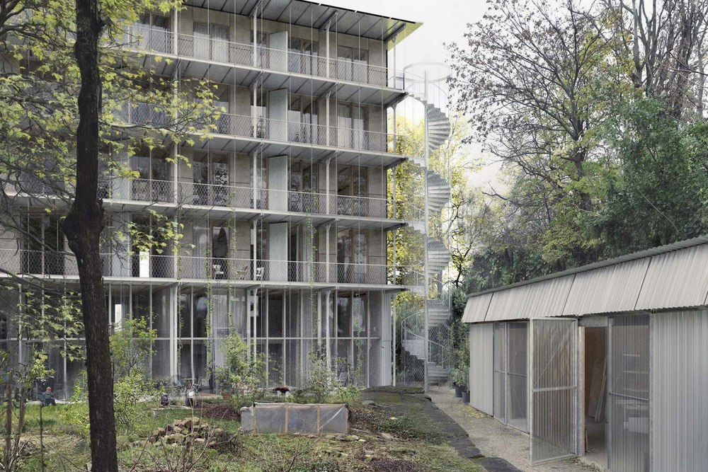 Moderner Wohnhauskomplex mit grünem Garten und Nebengebäude bei Tageslicht.